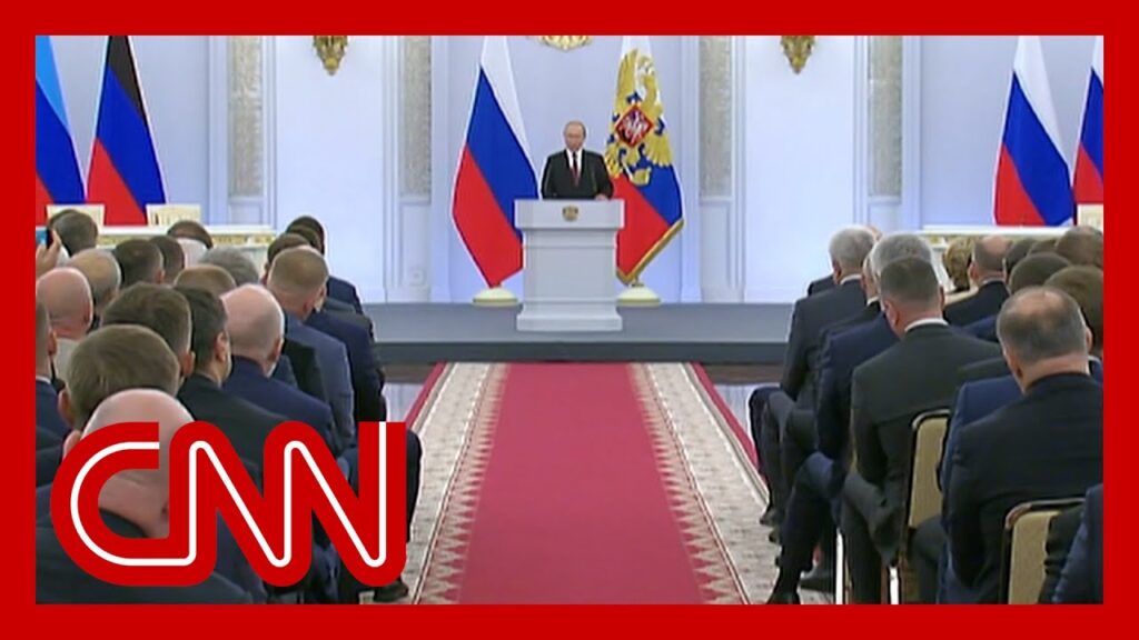 Hear what CNN reporter noticed about crowd watching Putin’s speech