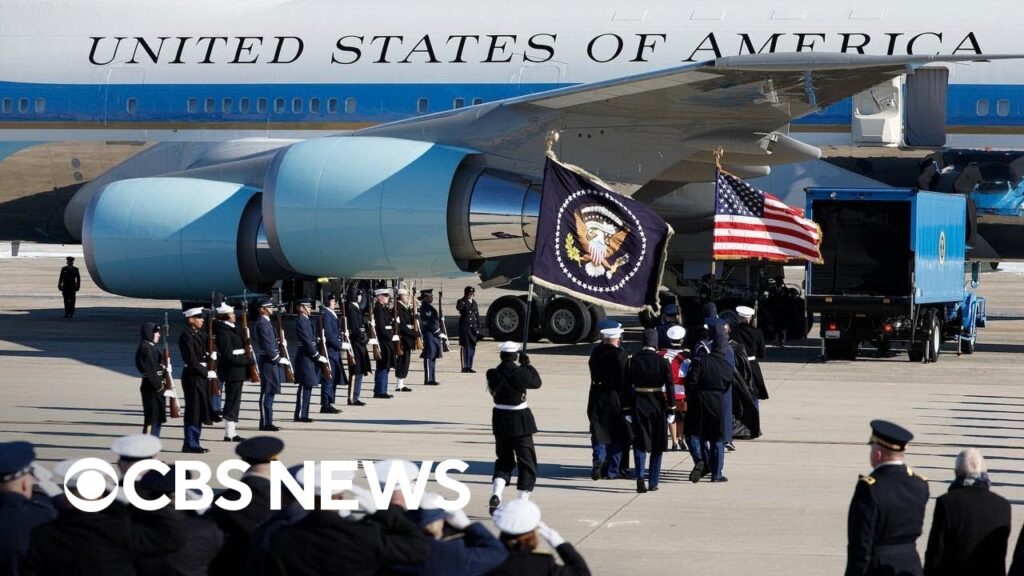 Jimmy Carter’s casket heads back to Georgia