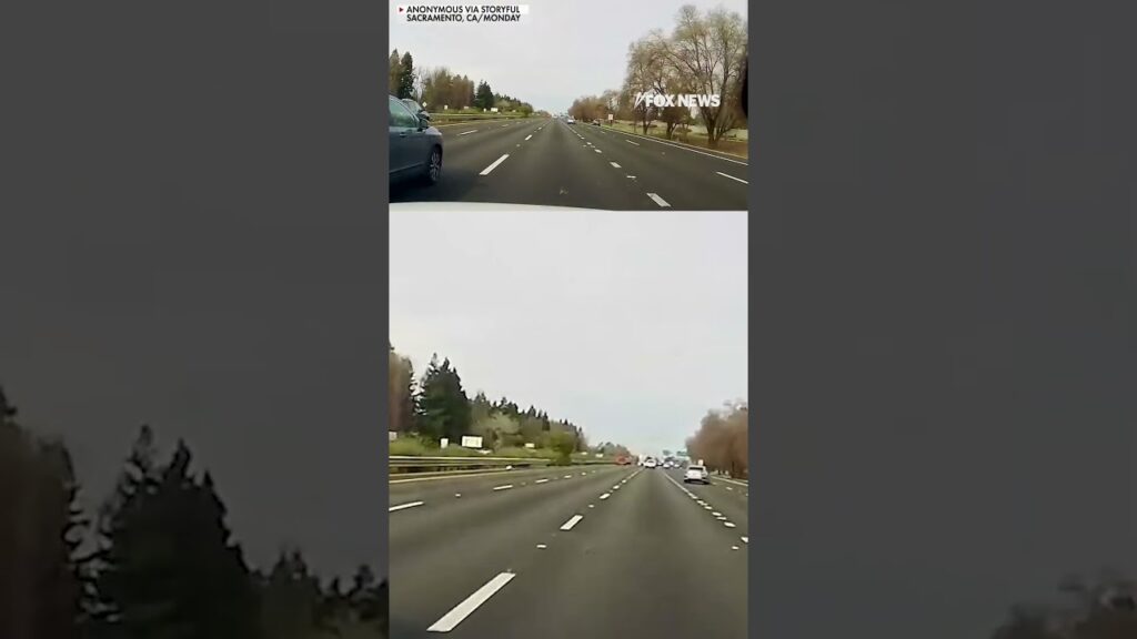 Car launches off overpass onto freeway in dramatic dashcam video