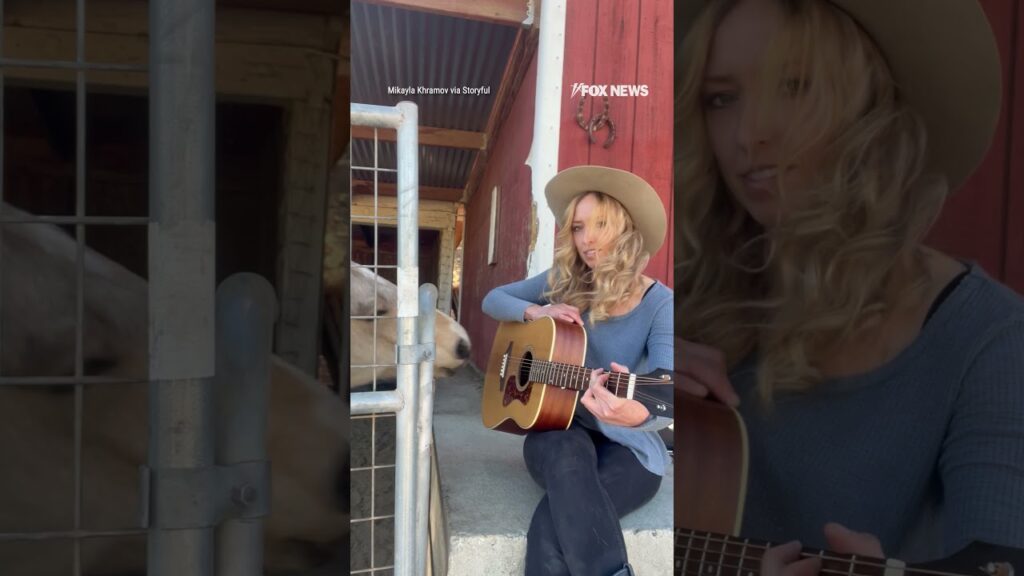 Music loving horse strums guitar on California farm