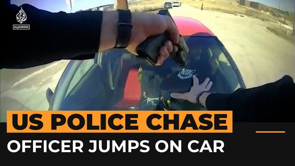 Video shows US police officer clinging to suspect’s speeding car | Al Jazeera Newsfeed