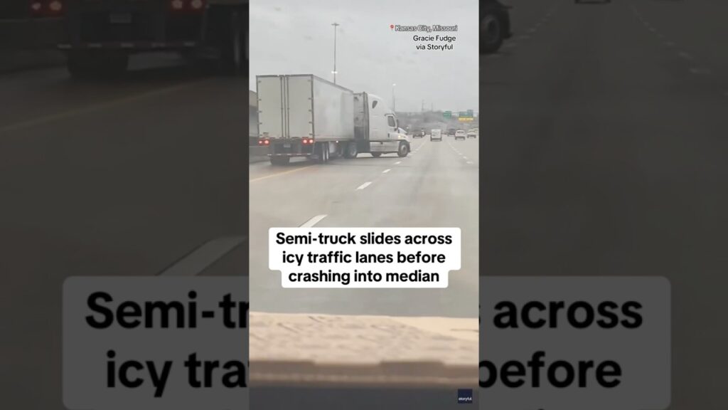 Semi-tuck in Missouri slides across icy traffic lanes before crashing into median #shorts