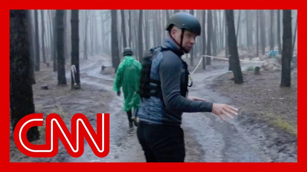 CNN reporter visits mass burial site after Russian soldiers retreat