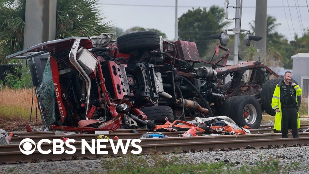 Commuter train collides with fire truck in Miami area, injuring several people