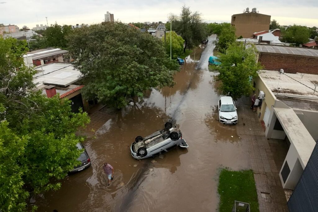 Officials say heavy rains in Argentina kill at least 15 as dozens reported missing