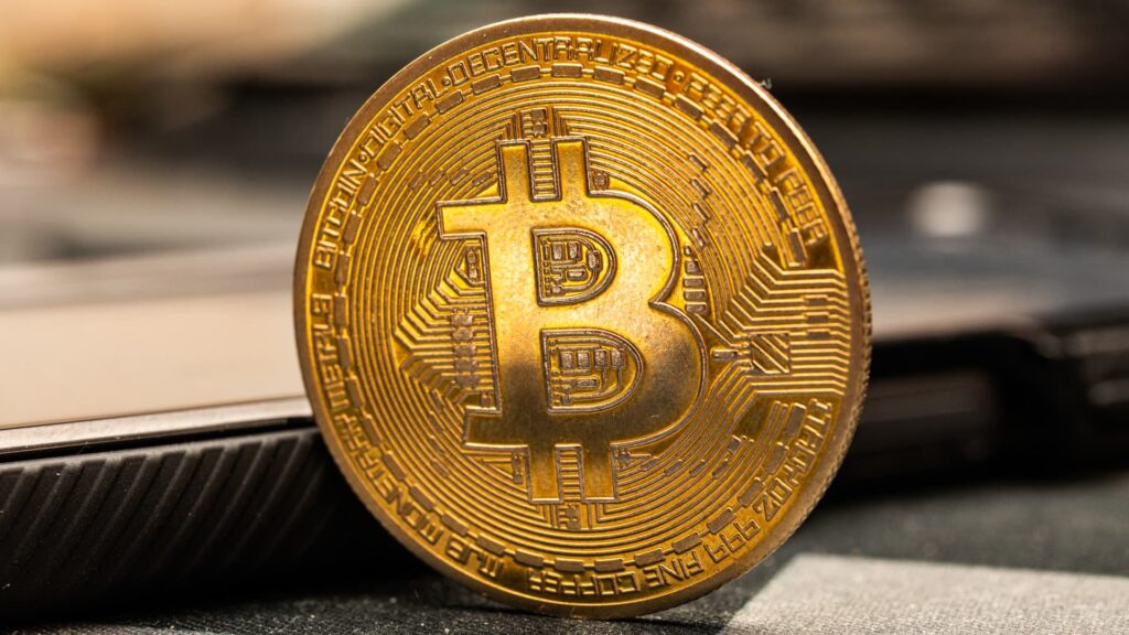 Bitcoin price hits new record high above 1,000