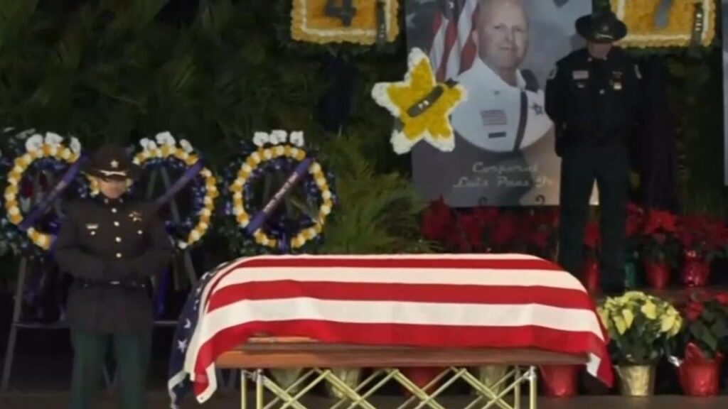 Trump attends memorial service for Florida law enforcement officials