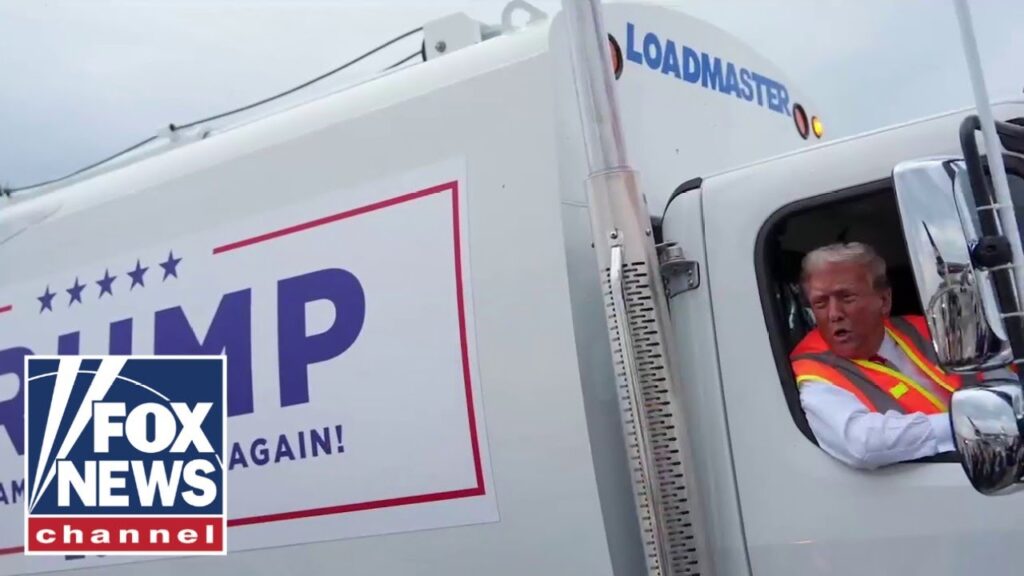 Garbage truck driven by Trump heads to inaugural parade