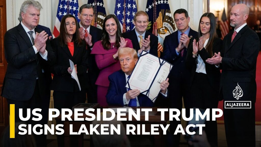 US President Trump signs Laken Riley act, in Washington