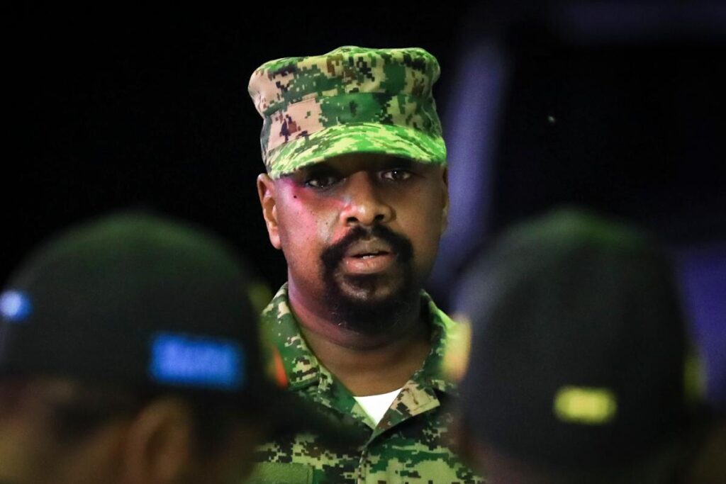 Uganda’s military chief says holding opposition activist ‘in my basement’