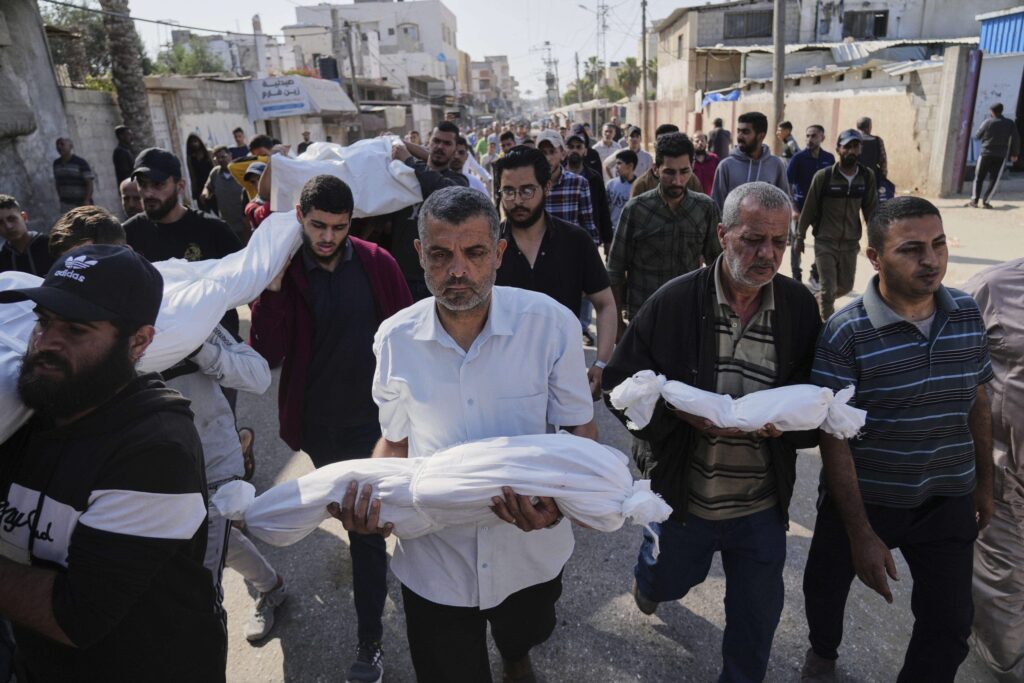 Gaza aid stalled as Israeli strikes kill at least 82 amid famine warnings