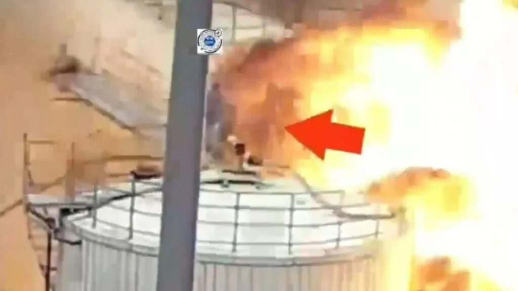 Watch moment worker runs for his life & dodges death by just inches as chemical tanks explode around him killing five