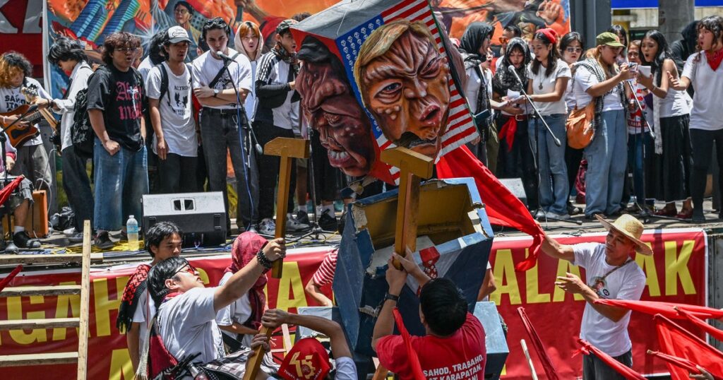 See photos of May Day protests around the world as Trump looms large