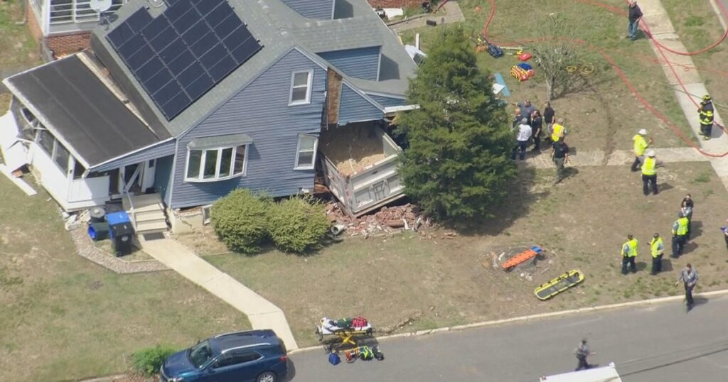 Dump truck slams into home in Woodbury Heights, New Jersey