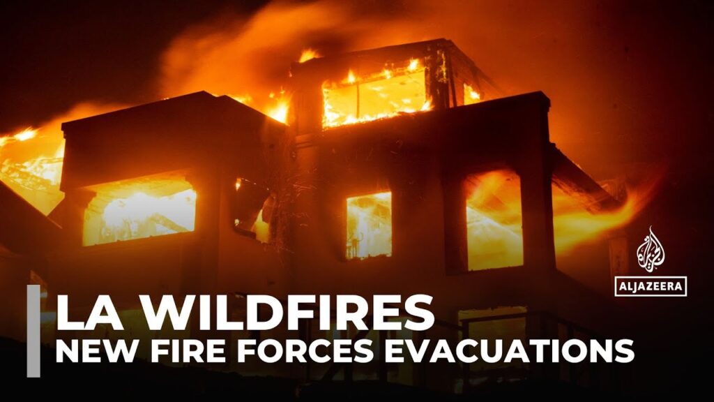 Five dead and thousands displaced as wildfires threaten Los Angeles area
