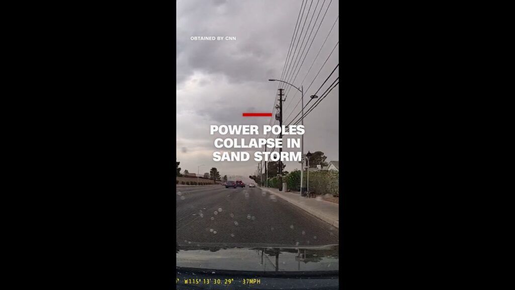 Power poles collapse onto cars during dust storm in Las Vegas
