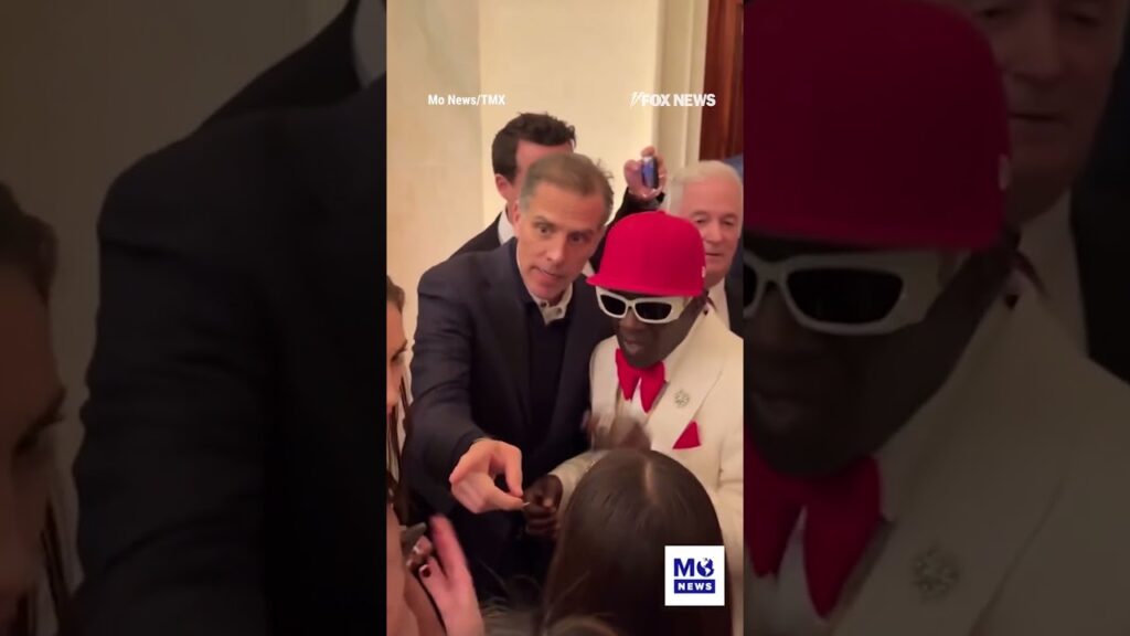 Hunter Biden gets friendly with Flavor Flav during Christmas party at the White House