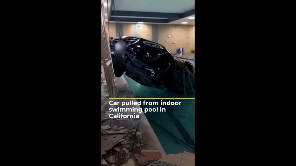 Car pulled from indoor swimming pool in California | AJ #shorts