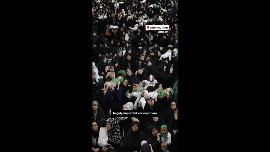 Hundreds of women offer babies as martyrs in Tehran ceremony