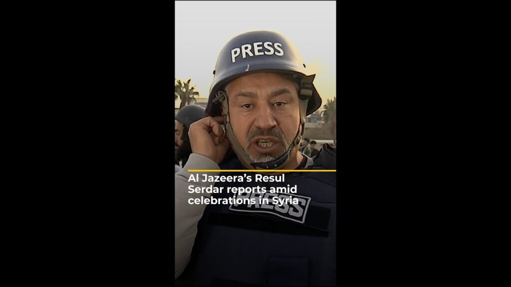 Al Jazeera reporter nearly drowned out by celebrations in Damascus | AJ#shorts