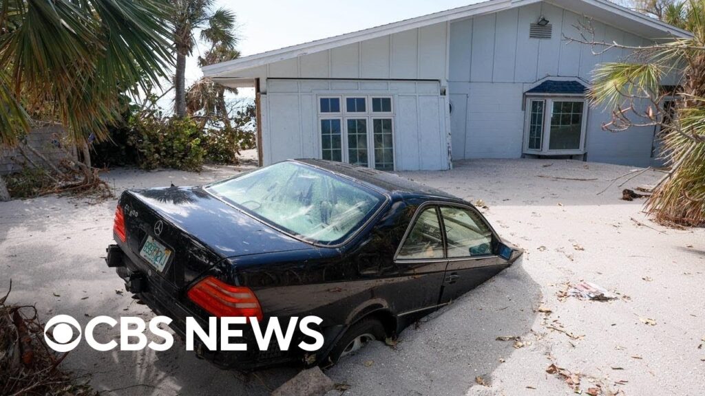 Hurricane Milton debris, sand cover Florida roads, homes