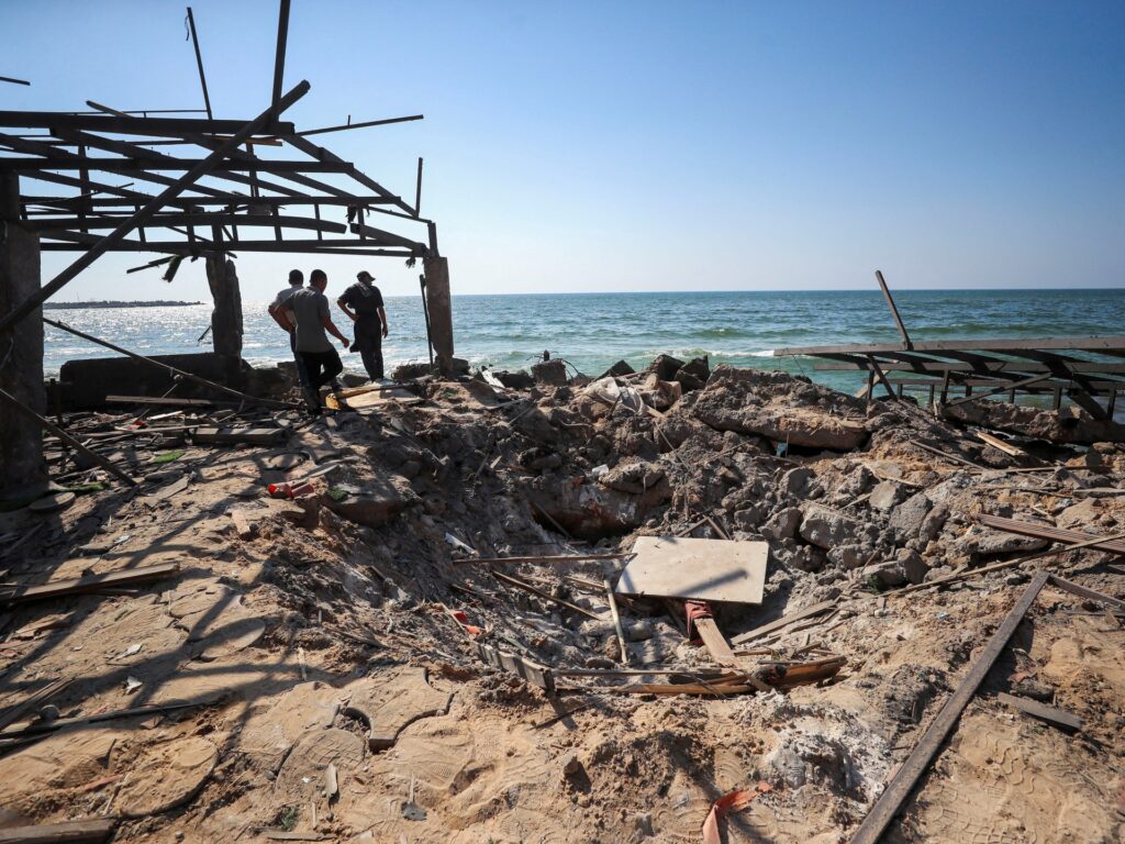 Israel bombs Gaza aid sites, cafe and school, killing 95 Palestinians | Gaza News