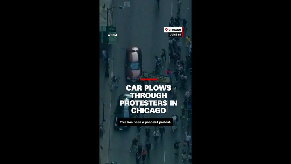 Car plows through protesters in Chicago