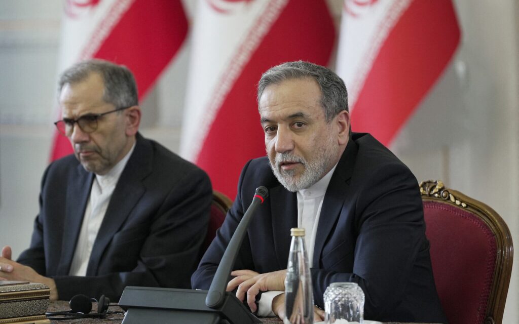 Iran says ‘negotiating with all our might’ to prevent sanctions snapback