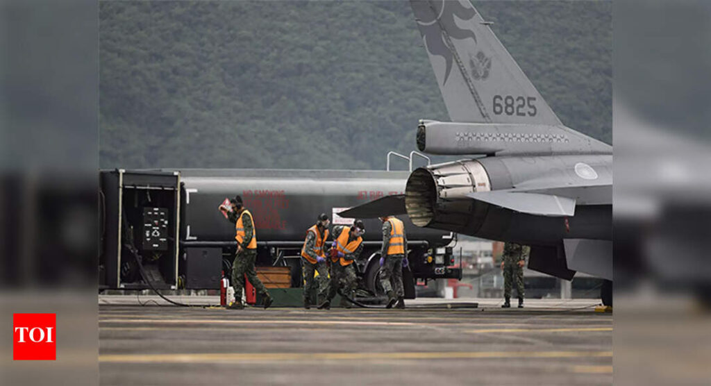 Taiwan reports 15 Chinese aircraft, 1 warship near island; majority cross median line