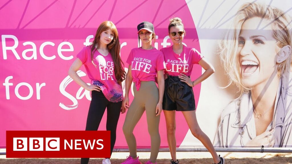 Girls Aloud stars run Race for Life in memory of Sarah Harding – BBC News