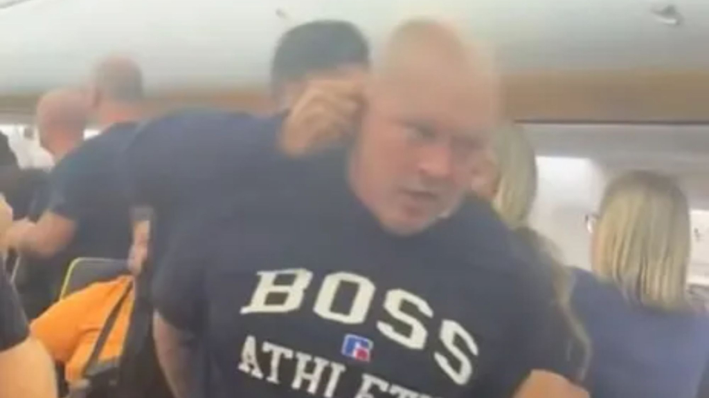 Drunk stag do Brit who was hauled off Ryanair plane by heavily armed French cops is named after he ‘tried to open door’