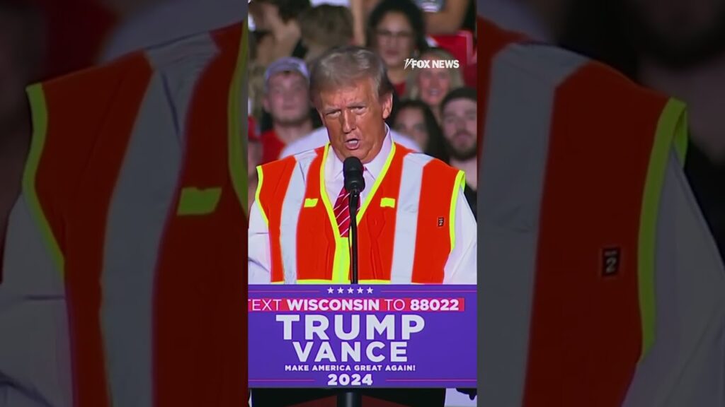 Trump wears orange reflective vest at Wisconsin rally