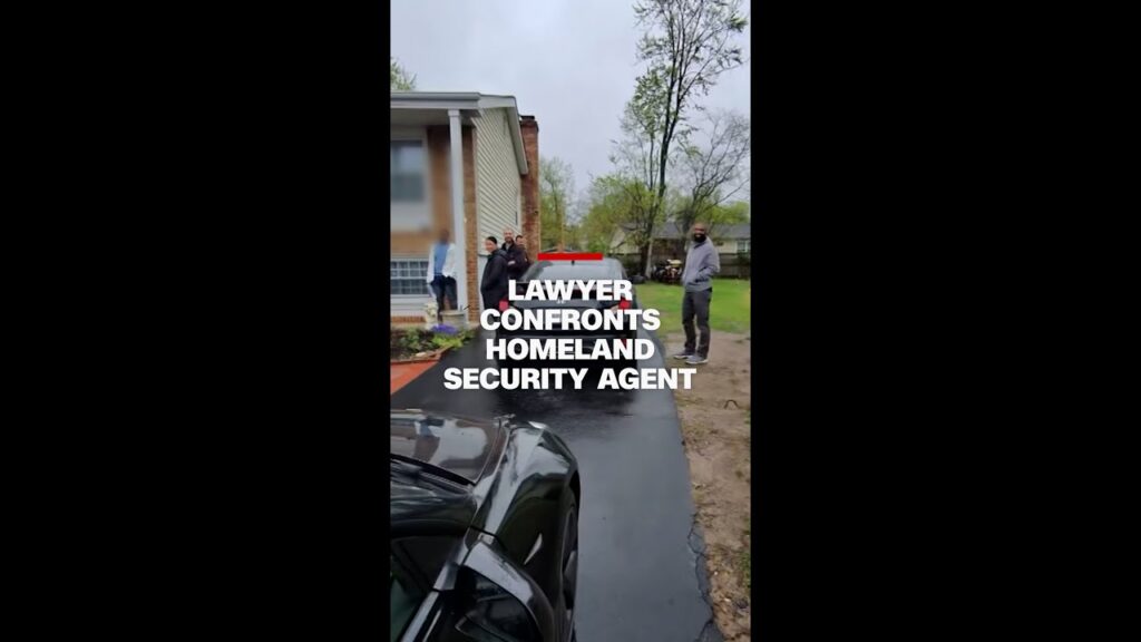 Lawyer confronts Homeland Security agent outside migrant client’s house