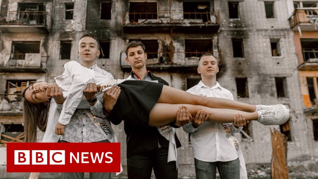 Ukraine high school students pose in prom dresses among ruins – BBC News