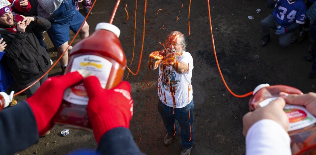 Wings, booze and heartbreak – what my research says about the hidden costs of sports fandom