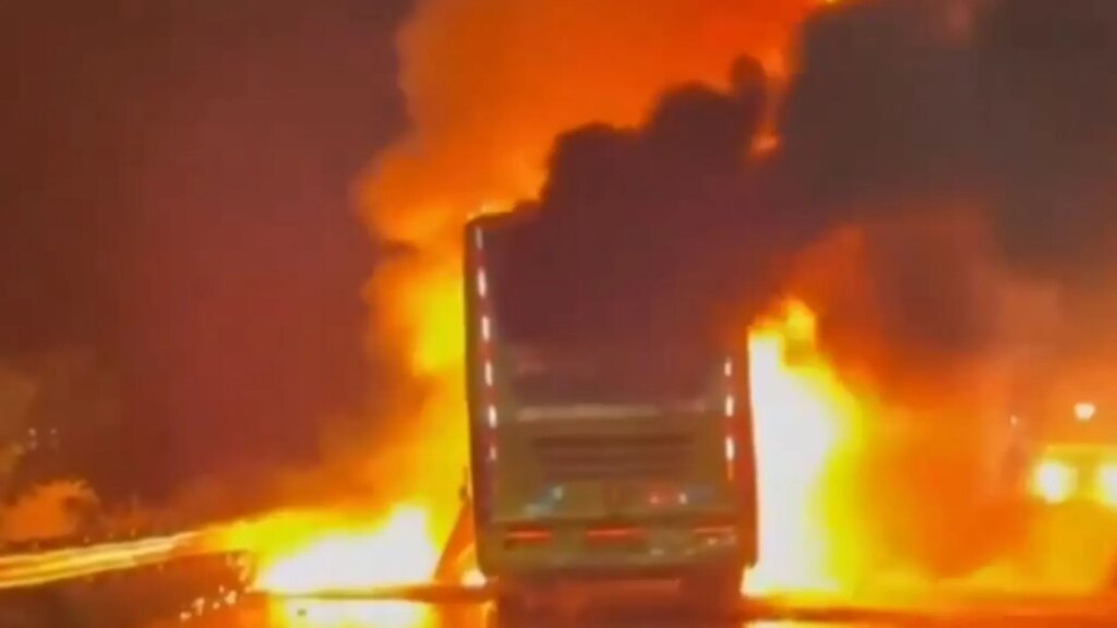 At least 25 killed and dozens injured after bus erupts into flames in horror crash in India